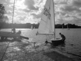Casting Off a Small Laser Class Sailing Boat at a Boat Club in Surrey