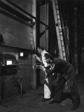 Metal Being Tempered in a Furnace Prior to Shaping