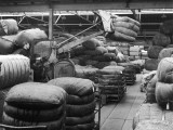 Moving Large Sacks in a Warehouse