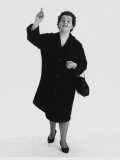 Full-Length Portrait of a Woman Waving