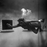 A Scuba Diver Inside a Large Metal Water Tank Photograph by Heinz Zinram