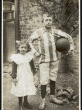 Girl and Boy Play Football