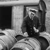 Customs Official Tests Imported Wine