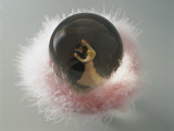 Close-Up of Figurines of Dancers in a Snow Globe