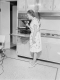 Woman Cooking in Kitchen