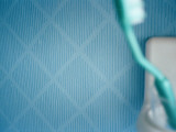 A Toothbrush in a Glass