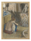 Femme nue  accroupie  de dos