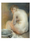 Femme nue se chauffant