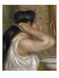 La toilette  femme se peignant
