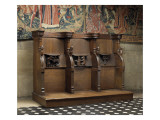 Trois stalles : Porc jouant de l'orgue  feuillage
