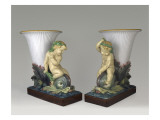 Two Vases of Fome Cornet Child Sitting on a Dolphin