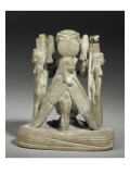 figurine magique : Ptah patèque tenant des couteaux  debout sur des crocodiles entouré d'Isis 