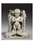 figurine magique : Ptah patèque tenant des couteaux  debout sur des crocodiles entouré d'Isis 