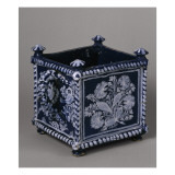 Paire de jardinières; motifs peints au blanc fixe et ocre sur fond bleu (bianco sopra azzuro 