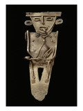 Figurine votive représentant un personnage fumant du tabac