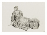 Jeune femme assise à terre