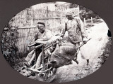 China  Porter Pushing a Chair Equipped with a Wheel