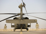 Crew Chiefs Stand Beside their UH-60L Black Hawk Helicopter