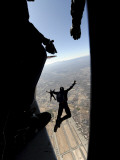 US Air Force Academy Parachute Team Jumps Out of an Aircraft over Nellis Air Force Base  Nevada