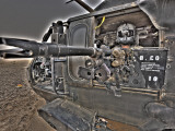 A UH-60 Black Hawk Door Gunner Manning a M240G Medium Machine Gun