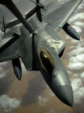 A US Air Force F-22 Raptor Is Refueled by a Kc-10A Extender Aircraft over Southwest Asia