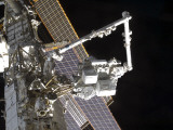 The Canadarm2 Mates the Express Logistics Carrier to the Outboard Payload Attachment System