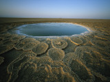 Discs of Travertine Ring a Twelve-Foot Wide Hot Spring