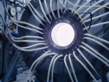 Physicist at Switchboard Sends High Voltage into a Fusion Chamber