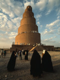 Women Shrouded in Black Approach the Spiral Minaret at Samarra