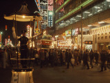 Pedestrians Swarm Through Kowloon's Shopping District