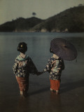 Modestly Attired Japanese Women Wade into Water to Bathe