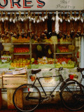 Rabbits Hang  over a Display of Fresh Fruits at a Village Grocery