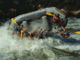 Class V Rapids Flip a Raft Full of Whitewater Enthusiasts