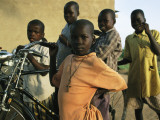 Orphan Boys Pose with their New Bikes