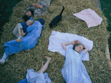 The Protiva Family Enjoys the Relaxing Virtues of a Cart Full of Hay
