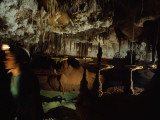 An Explorer Carefully Moves Through Delicate Formations