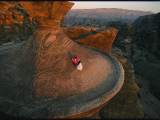 A Bedouin Surveys the View from the Rooftop of Al Deir  the Monastery