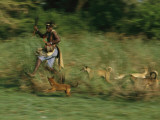 The 'Dog Man  on a Hunt with His Dogs