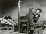 Researcher Tests a Pilot's Bed
