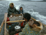 An Inuit Family Travels a Long Distance in an Open Boat
