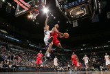 Los Angeles Clippers v Minnesota Timberwolves: Eric Gordon and Luke Ridnour