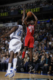 New Jersey Nets v Dallas Mavericks: Travis Outlaw and Ian Mahinmi