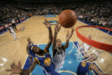Golden State Warriors v Dallas Mavericks: Alexis Ajinca  Dorrell Wright and Andris Biedrins