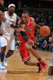 Chicago Bulls v Denver Nuggets: CJ Watson and Ty Lawson