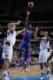 Detroit Pistons v Dallas Mavericks: Rodney Stuckey  Dirk Nowitzki and Caron Butler
