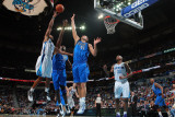 Dallas Mavericks v New Orleans Hornets: Willie Green  Brendan Haywood and Dirk Nowitzki