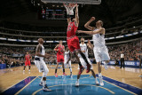 Chicago Bulls v Dallas Mavericks: Taj Gibson  Dirk Nowitzki and Caron Butler