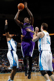 Sacramento Kings v New Orleans Hornets: Samuel Dalembert  David West and Jason Smith