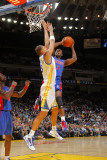 Detroit Pistons v Golden State Warriors: Rodney Stuckey and Andris Biedrins