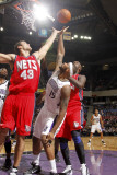 New Jersey Nets v Sacramento Kings: DeMarcus Cousins and Kris Humphries